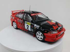 Mitsubishi  - Lancer EVO VI #2 1999 red/black - 1:18 - Triple9 Collection - 1800210 - T9-1800210 | Toms Modelautos