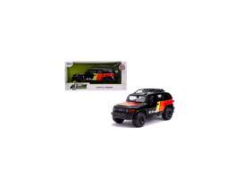 Toyota - FJ Cruiser 2007 black/red/yellow - 1:24 - Jada Toys - 31595 - jada31595 | Toms Modelautos Toyota - FJ Cruiser 2007 black/red/yellow - 1:24 - Jada Toys - 31595 - jada31595 | Toms Modelautos