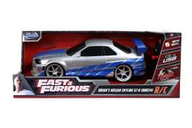 Nissan  - Skyline GT-R *Radio Control* 2002 silver/blue - 1:16 - Jada Toys - 99370 - jada253206007 | Toms Modelautos