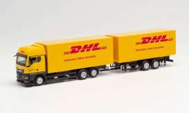 MAN  - TGX GM yellow/red - 1:87 - Herpa - H313049 - herpa313049 | Toms Modelautos