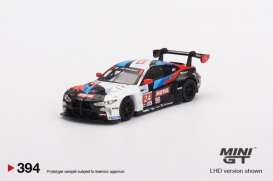 BMW  - M4 GT3 2022 white/black/red/blue - 1:64 - Mini GT - 00394-L - MGT00394lhd | Toms Modelautos