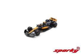 McLaren  - MCL60 2023 black/orange - 1:64 - Spark - Y360 - spaY360 | Toms Modelautos