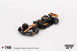 McLaren  - MCL60 2023 orange/black - 1:64 - Mini GT - 00768-L - MGT00768lhd | Toms Modelautos