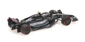 Mercedes Benz AMG - W14 2023 black/green - 1:43 - Minichamps - 417230344 - mc417230344 | Toms Modelautos