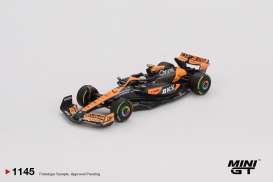 McLaren  - 2024 black & orange - 1:64 - Mini GT - 01145L - MGT01145 | Toms Modelautos