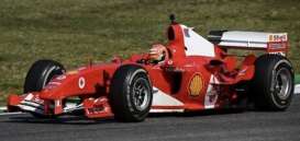 Ferrari  - F2004 2004 red/white - 1:43 - Bburago - 18-38601 - bura38601 | Toms Modelautos
